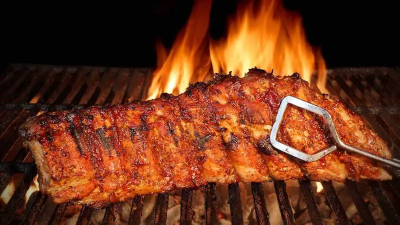 should you flip ribs when grilling